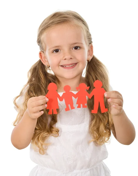 Маленькая девочка держит бумагу - семейная концепция — стоковое фото