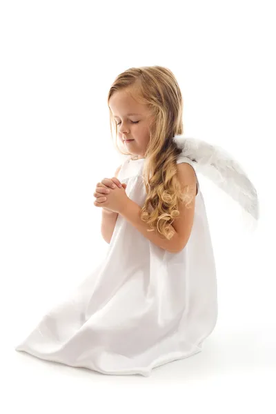 Dziewczynka anioł modli się — Zdjęcie stockowe