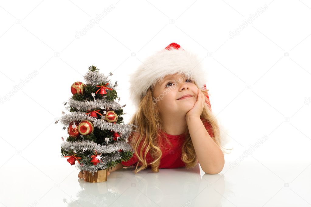 Little girl dreaming of a white christmas