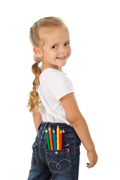 Menina com lápis coloridos no bolso traseiro isolado — Fotografia de Stock