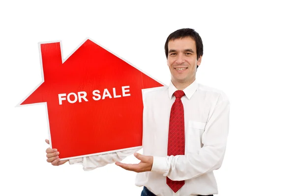 Agente inmobiliario con signo en forma de casa — Foto de Stock