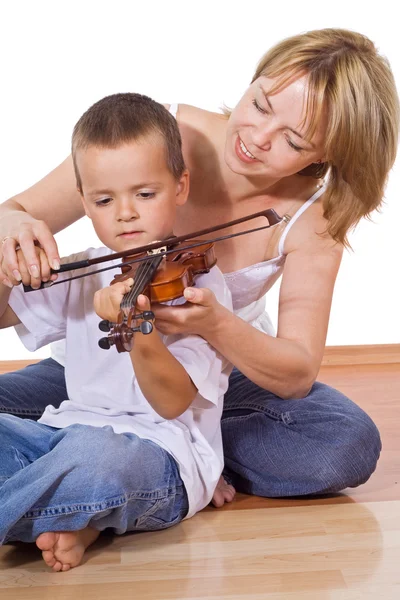 Mulher ensinando seu filho — Fotografia de Stock