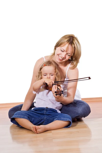 Mulher ensinando menina a tocar violino — Fotografia de Stock