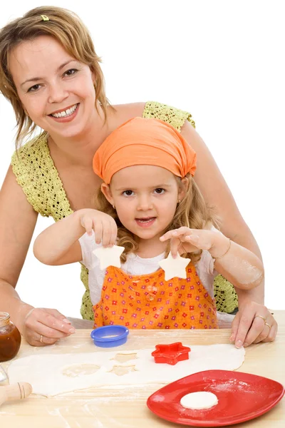 Kadın ve küçük kızı kurabiye yapma — Stok fotoğraf