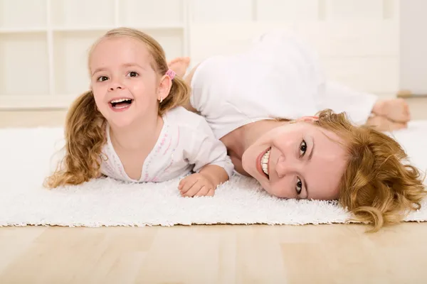 Woman and little girl playing and having fun — Stock Photo, Image