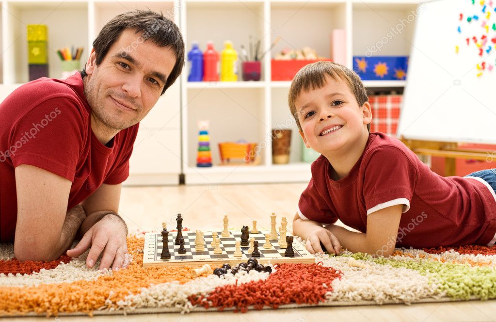 Look I am beating dad at chess