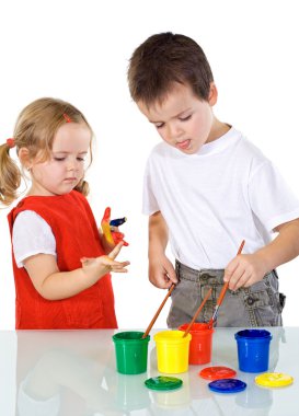 Kids having some fun with paints clipart