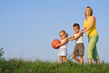 Woman and kids having fun together clipart