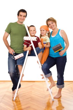 Happy family with painting utensils clipart