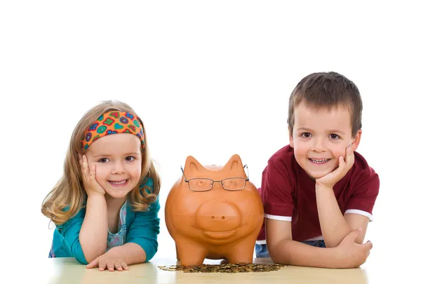 Crianças com seu banco porquinho especialista — Fotografia de Stock