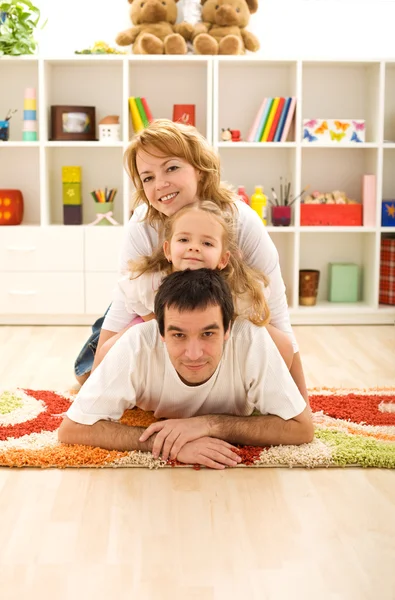 Happy casual family at home — Stock Photo, Image