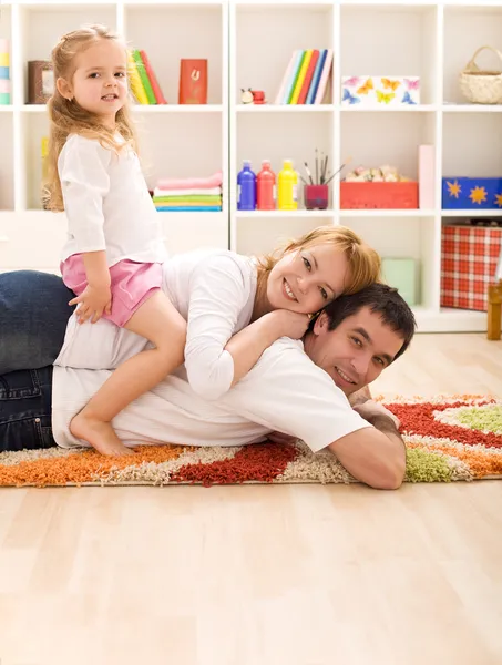 Happy family with a kid — Stock Photo, Image