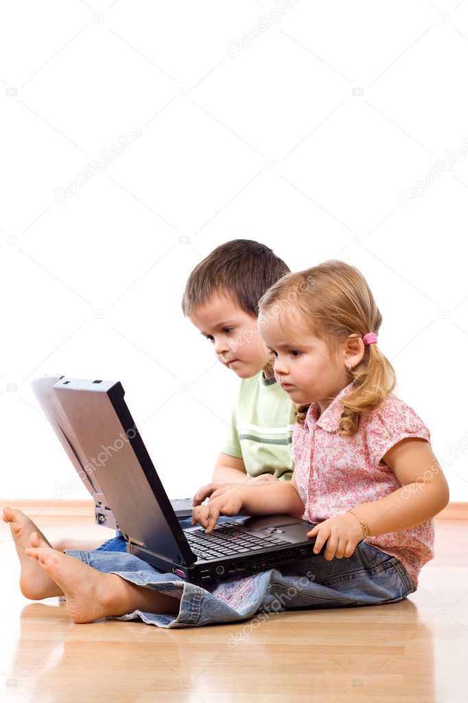 Kids using laptops