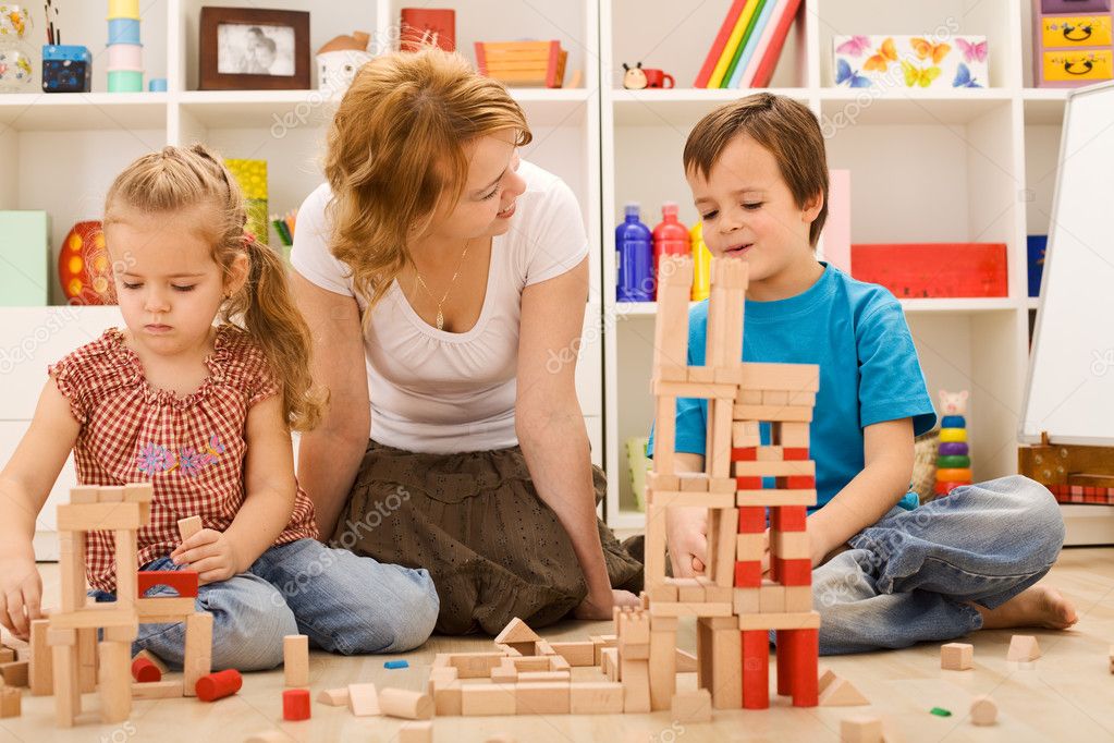 http://static6.depositphotos.com/1144191/643/i/950/depositphotos_6430602-Building-with-wooden-blocks-together-is-fun.jpg