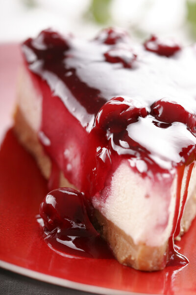 Cherry cheesecake with mint garnish
