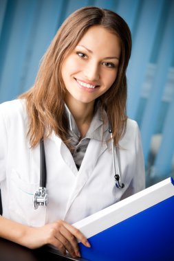 Young happy smiling successful female doctor clipart