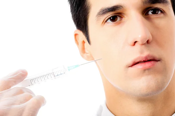 Muž s injekční stříkačkou, izolované na bílém — Stock fotografie