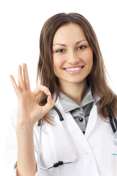 Happy female doctor with okay gesture, isolated on white — Stock Photo, Image