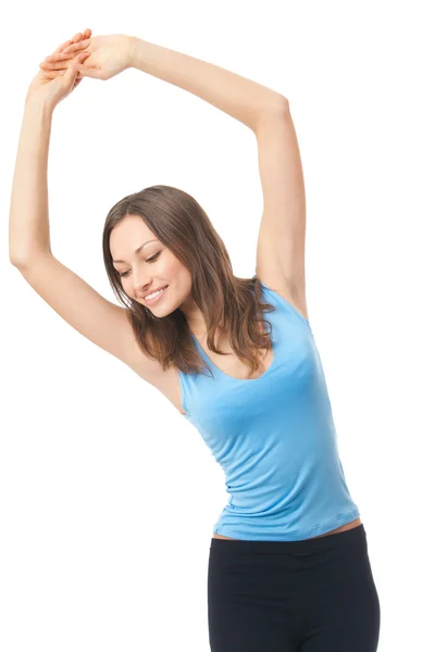 Jovem mulher feliz fazendo exercícios ou dançando, isolada em branco — Fotografia de Stock