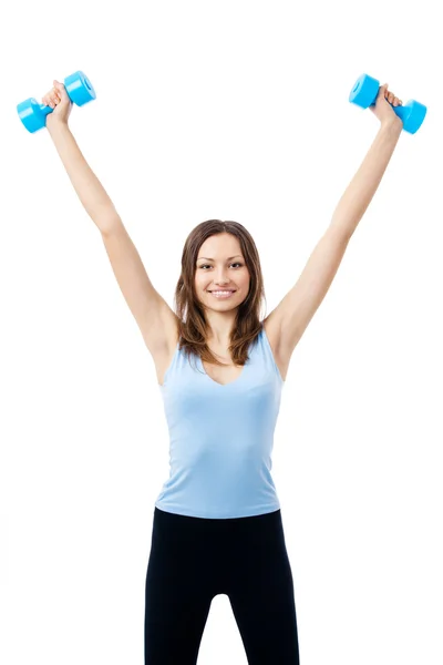 Junge glücklich lächelnde Frau in Sportbekleidung, die Fitnessübungen macht — Stockfoto