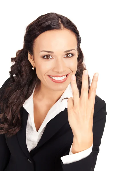 Geschäftsfrau zeigt drei Finger, auf weiß — Stockfoto