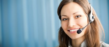 Portrait of happy smiling support phone operator in headset at w clipart