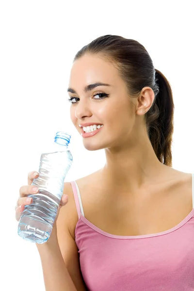 Молодая счастливая улыбающаяся женщина в спортивной одежде с водой — стоковое фото