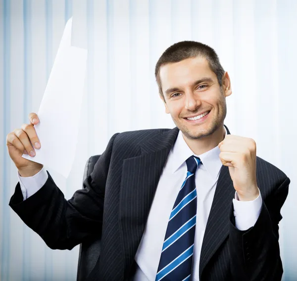 Businessman with document at office — Stock Photo, Image