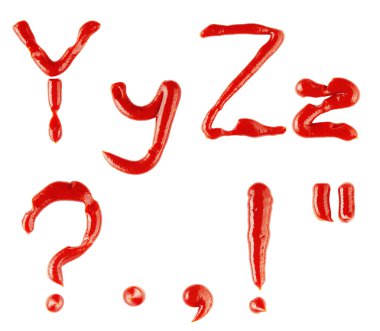Letters and signs made of ketchup on white background clipart