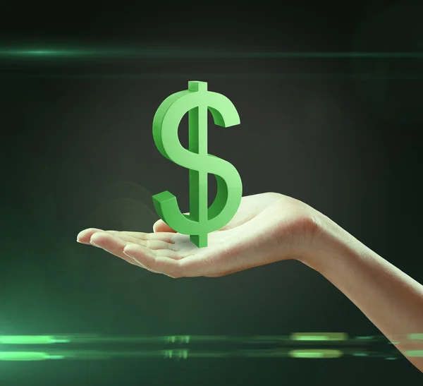 一个女人的手上的 3d 绿色美元符号 — 图库照片