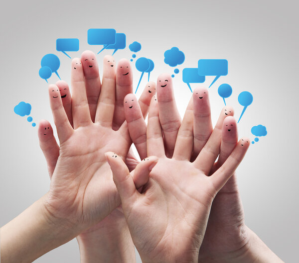 Happy group of finger smileys with social chat sign and speech bubbles
