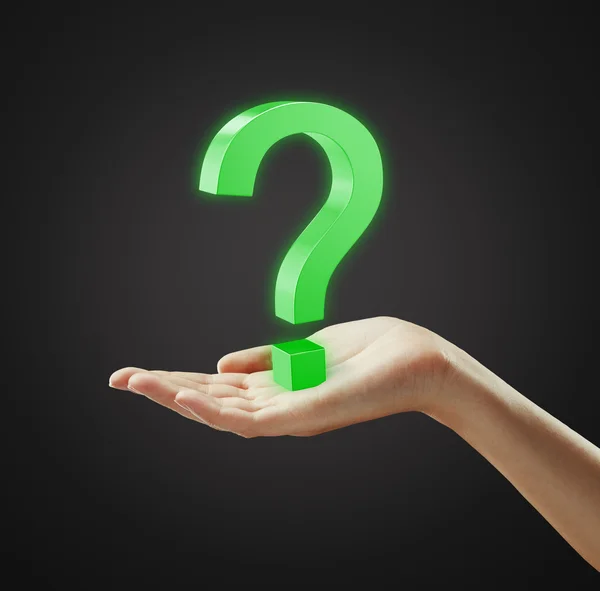 Green question mark on a woman's hand — Stock Photo, Image