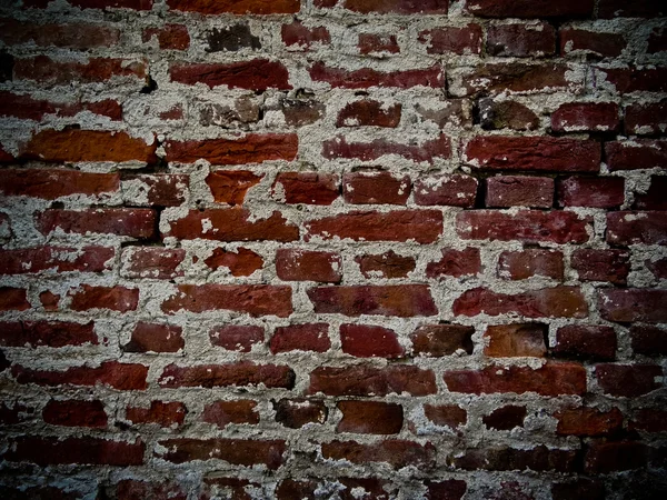 stock image Brick wall with facing of concrete