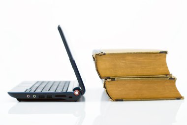 Books and laptop. clipart