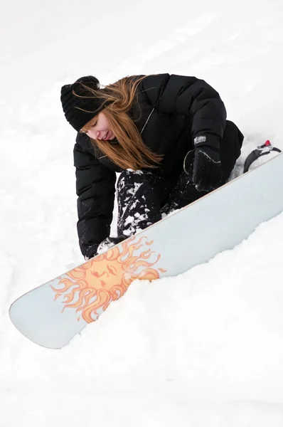 Meisje snowboarden — Stockfoto