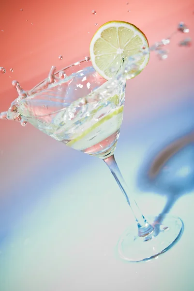 stock image Glass of water with lemon inside