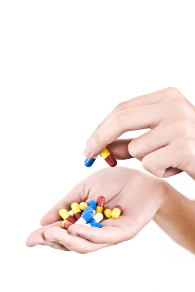 stock image Hand full of pills