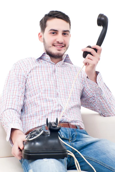 成人年轻英俊的男子接听电话 免版税图库图片