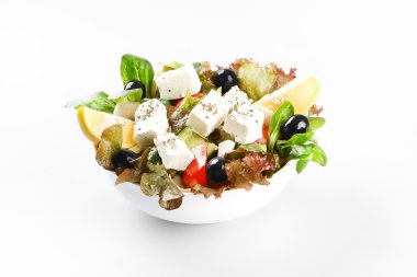 Greece salad on white background clipart