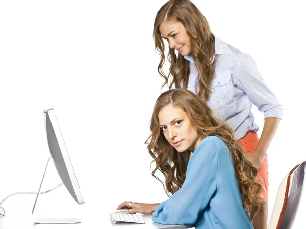 Girls at desk — Stock Photo, Image