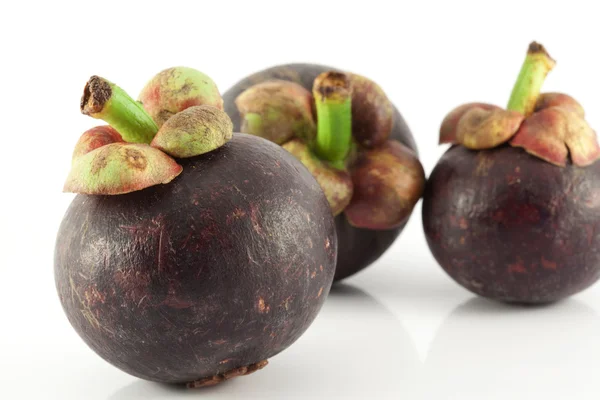 Mangosteen on white background Royalty Free Stock Images