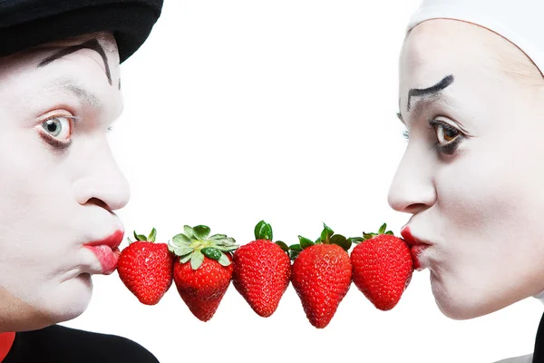 stock image Couple of mims with the strawberry on a white background