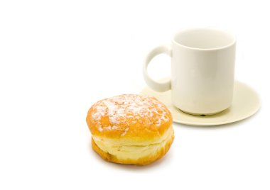 Chocolate donut and a cup of tea