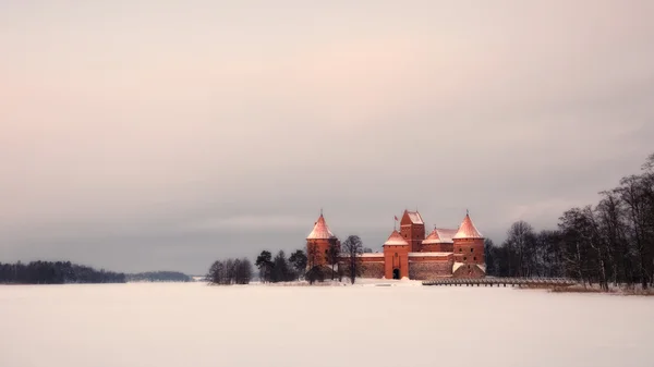 Trakai Island Castle at sunset in winter. — Stock Photo, Image