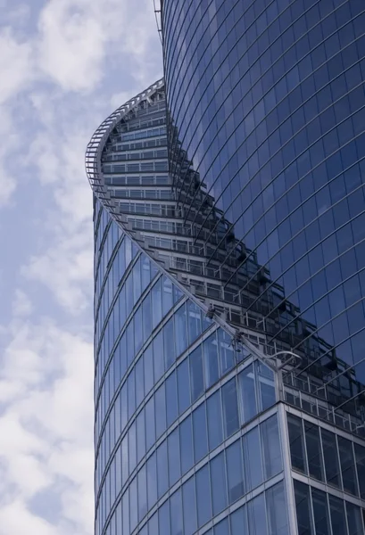 Part of a skyscraper on blue sky — Stock Photo, Image