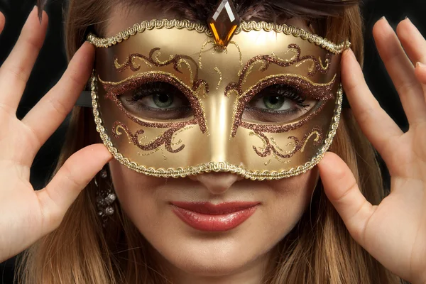 Hermosa chica con máscara de carnaval Fotos de stock