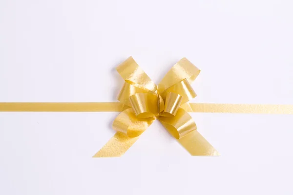 Arco de regalo de satén dorado. Cinta. . — Foto de Stock