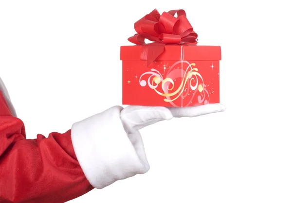 Brazo de Papá Noel con regalo — Foto de Stock