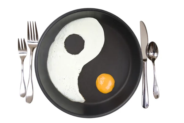 YIn-Yang eggs in a frying pan — Stock Photo, Image