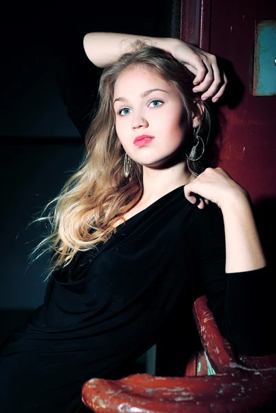 stock image Attractive blond girl at stairs